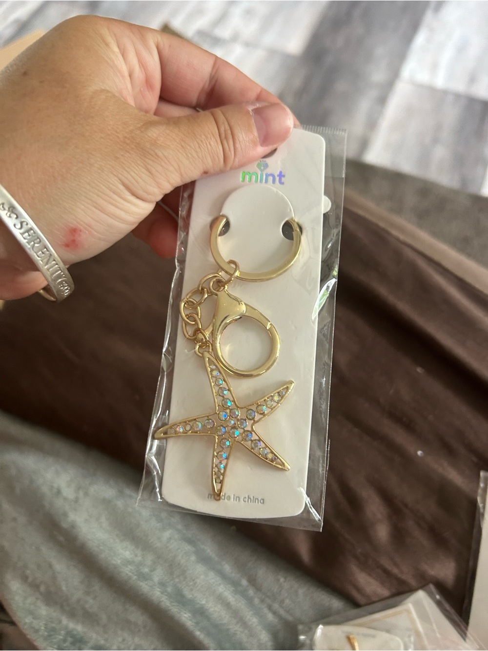 4/$50 Mint Gold Starfish Keychain with Iridescent Accents